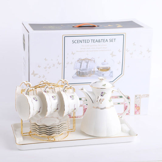 Vintage Floral Porcelain Tea Set with Gold Accents & Elegant Display Rack