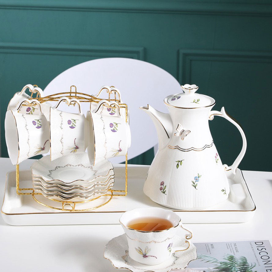 Vintage Floral Porcelain Tea Set with Gold Accents & Elegant Display Rack
