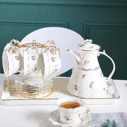Vintage Floral Porcelain Tea Set with Gold Accents & Elegant Display Rack